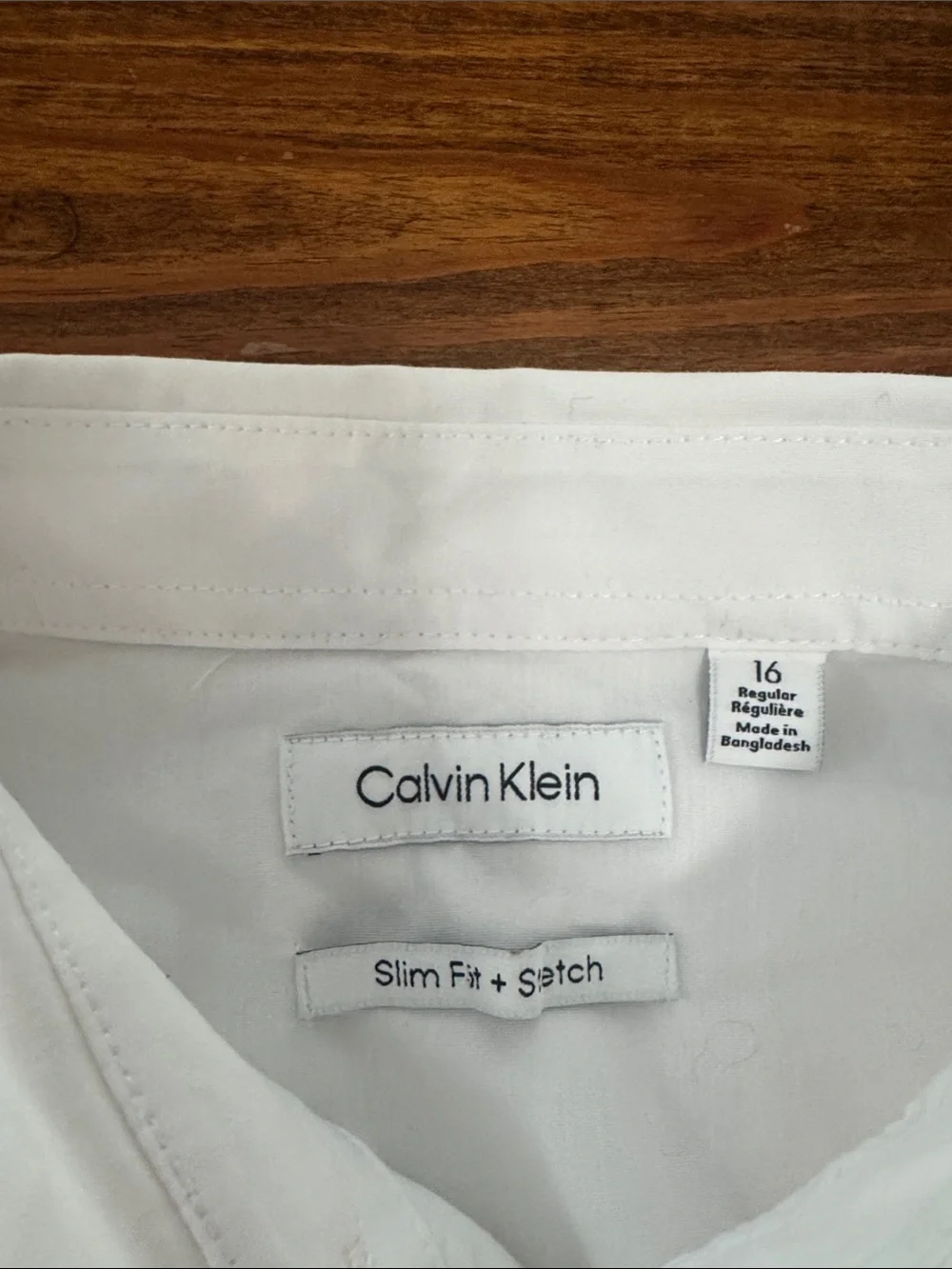 Boys size 16. Calvin Klein White Dress Shirt - slim fit and stretch.